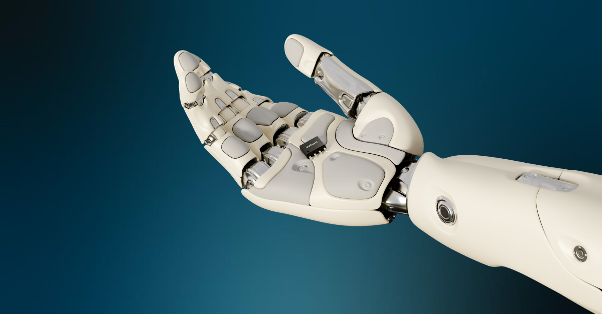 An advanced robotic hand with tactile sensing elements holding a Melexis microchip.